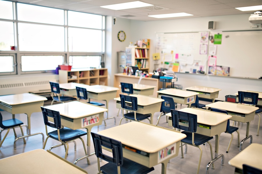 empty classroom with desks