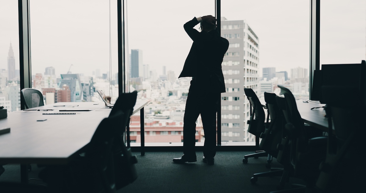 Businessman on the phone appearing stressed