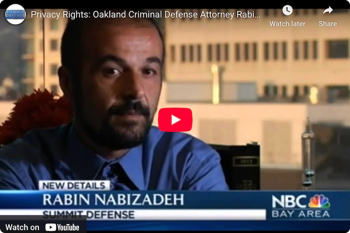 A man in a dress shirt and tie is shown in an interview, with the name Rabin Nabizadeh and NBC Bay Area displayed on screen, along with the text Privacy Rights: Oakland Criminal Defense Attorney.