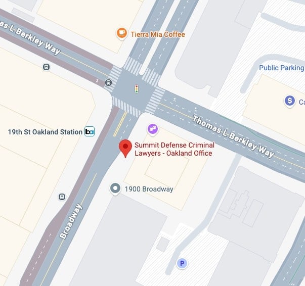 Map showing the intersection of Thomas L Berkley Way and Broadway in Oakland, California, highlighting Summit Defense Criminal Lawyers, 19th St Oakland Station, and Tierra Mia Coffee nearby.